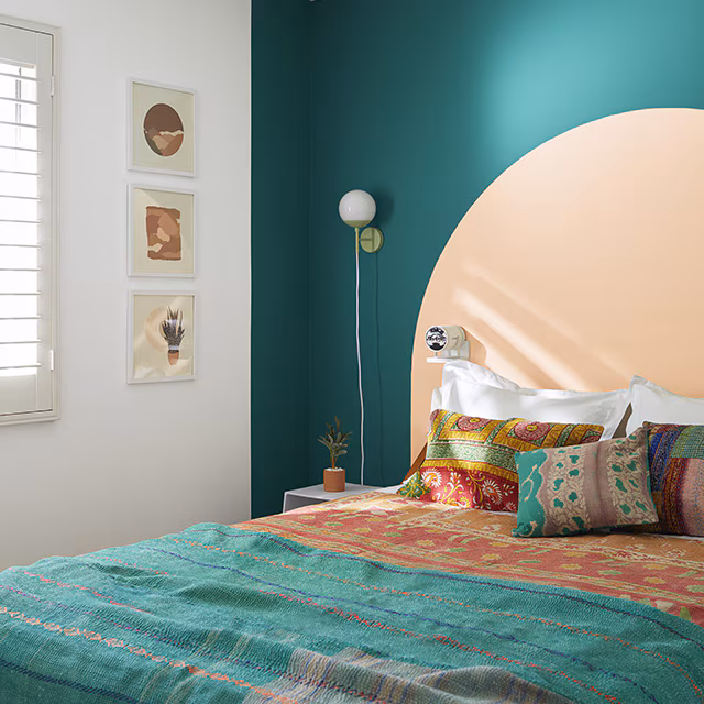 teal-green-paint-peach-bedroom-accent-wall-640x640